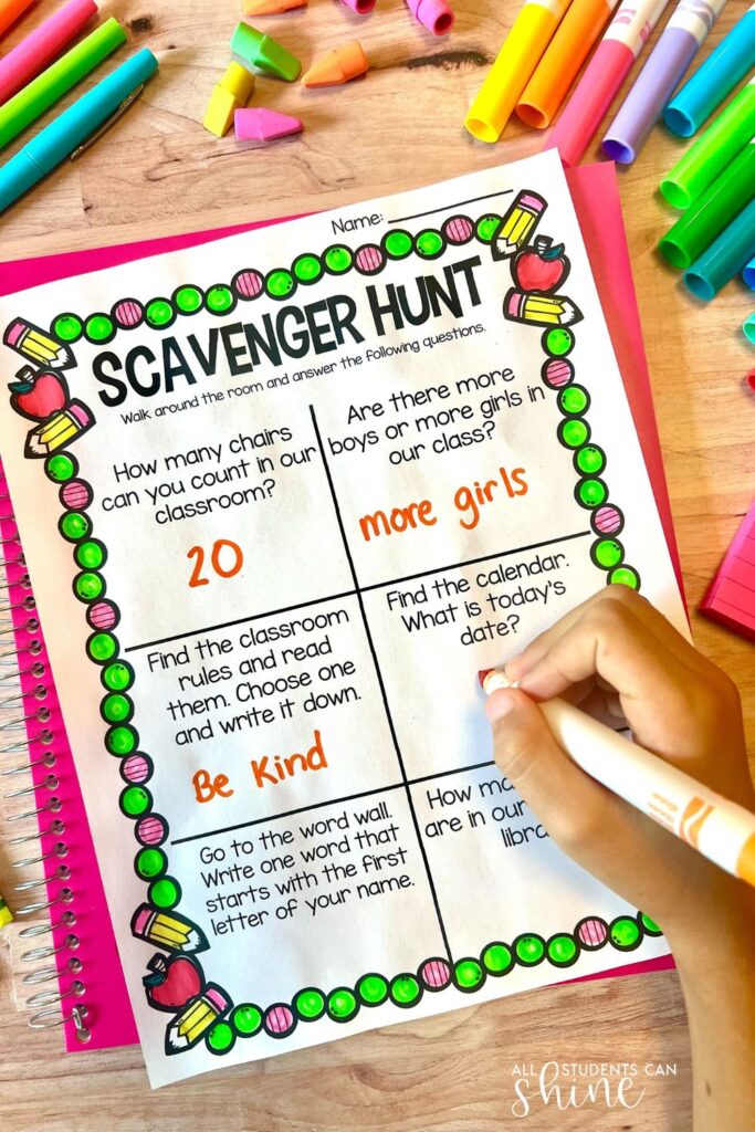 Colorful scavenger hunt worksheet for students to complete during the first week of school, with questions about the classroom and classmates.