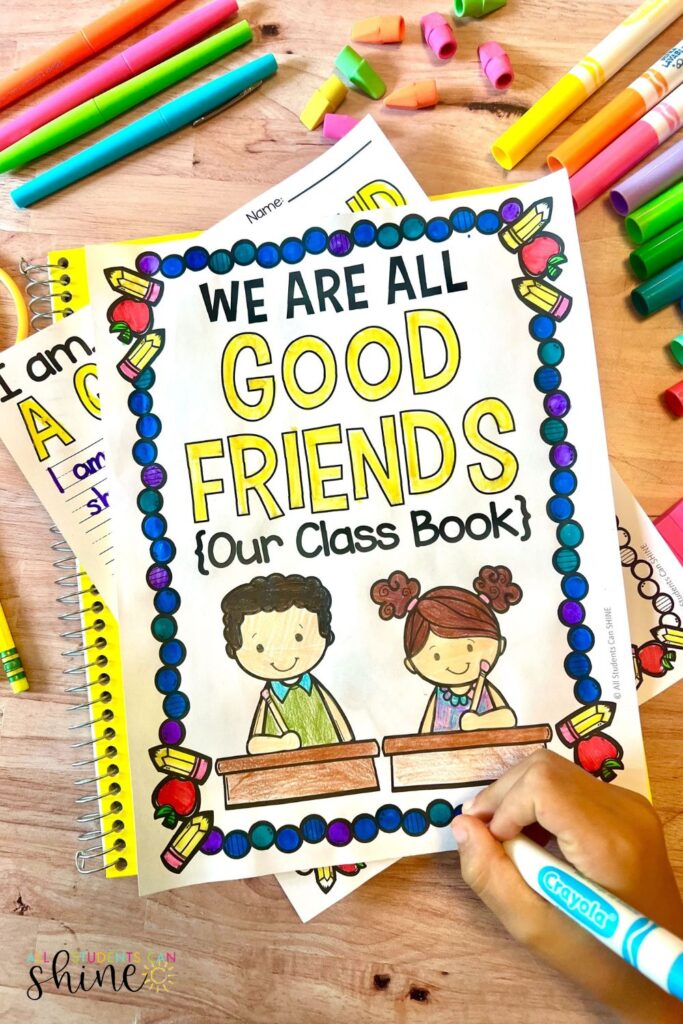 “We Are All Good Friends” class book cover being colored by a student during the first week of school.