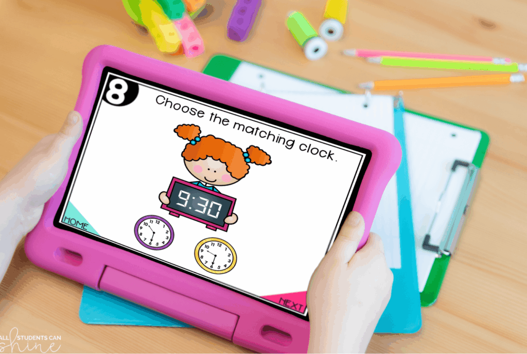 Child using a tablet for a digital math activity, matching an analog clock to a digital time. Digital task cards give early finishers independent, skill-building practice.