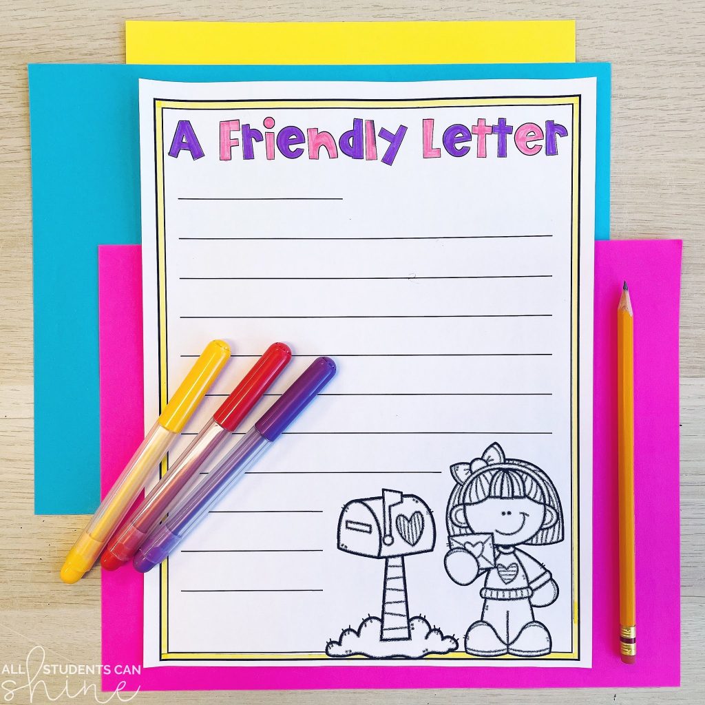 A printable friendly letter template designed for free friendship activities in the classroom. The worksheet includes a cartoon-style girl holding a letter next to a heart-decorated mailbox. With a colorful border and lined spaces, students can practice writing letters to friends. The template is placed on a desk with bright paper, colorful pens, and a pencil, making it an easy-to-use resource for teachers.